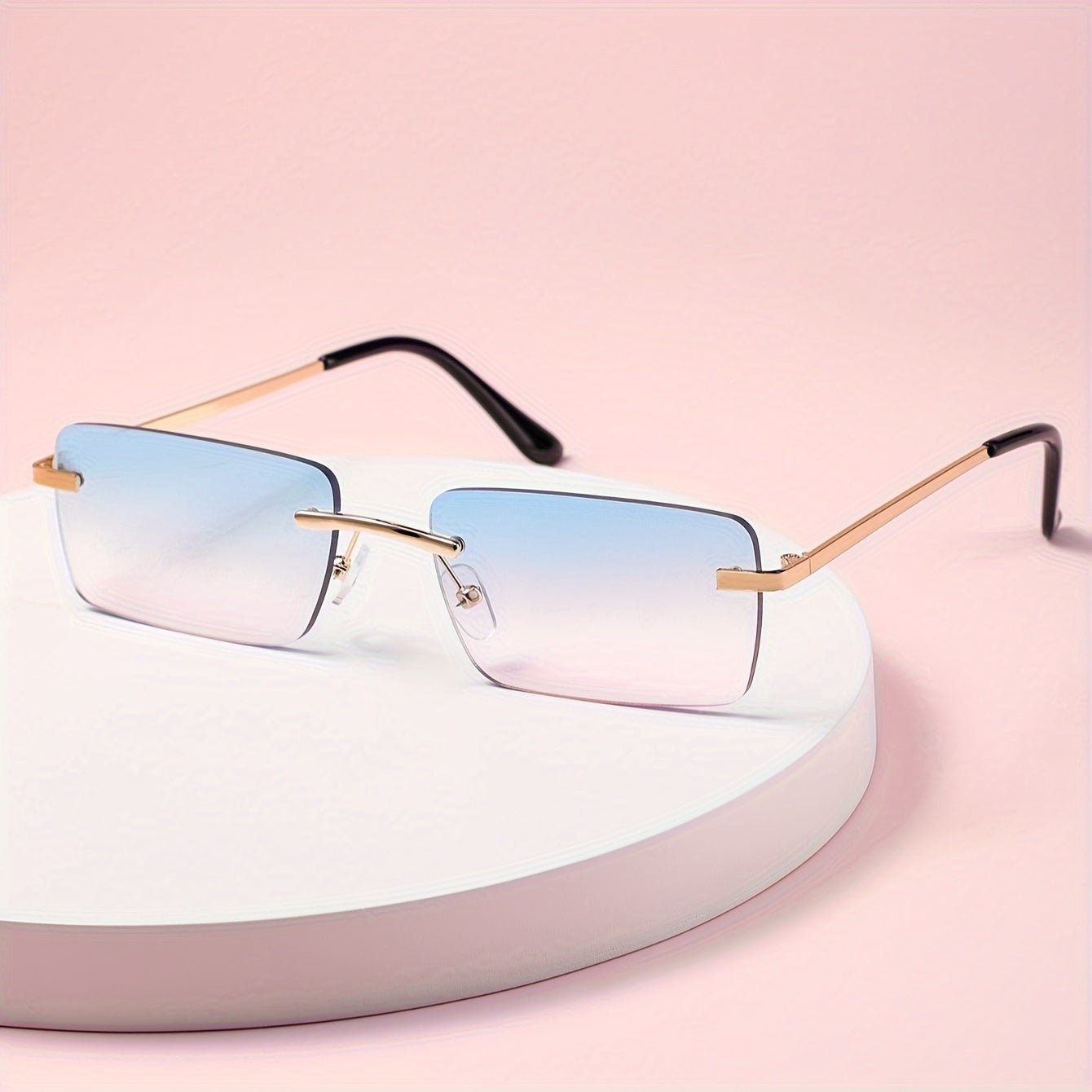 Men's sunglasses featuring a lightweight metal frame and frameless design, providing UV protection for stylish and comfortable outdoor wear. 0